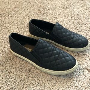 Black Steve Madden slip-ons